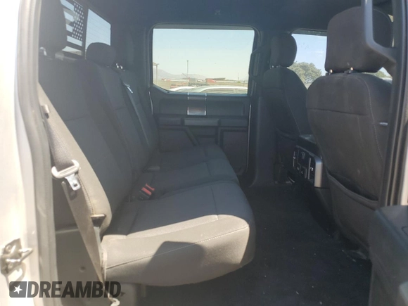 2018 Ford F-150 XL with VIN 1FTEW1CGXJFB40297, listed as a Copart auction lot 69642404 with 92,561 mi miles and Salvage title. Bid and sale history available at DreamBid. Image 10.