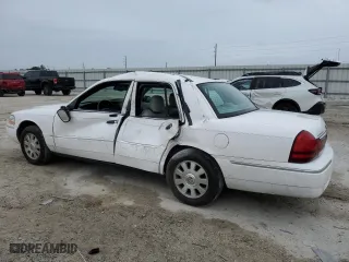 2003 Mercury Grand Marquis LS Premium with VIN 2MEHM75W53X697294, listed as a Copart auction lot 73021464 with 118,480 mi miles and Salvage Title. Bid and sale history available at carsss.com. Image 2.