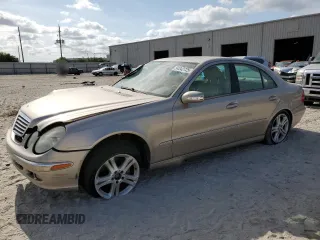 2005 Mercedes-Benz E 5.0L with VIN WDBUF70J35A696614, listed as a Copart auction lot 54342725 with 147,556 mi miles and Salvage Title. Bid and sale history available at carsss.com. Image 1.