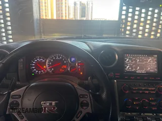 2009 Nissan GT-R Premium z VIN JN1AR54F89M252013, wystawiony jako Copart lot #82469654 z przebiegiem 66 337 mil mil oraz Szkoda całkowita • Salvage title. Historia ofert i sprzedaży dostępna na DreamBid. Obrazek 9.