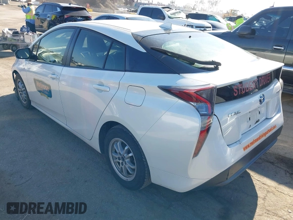 2016 Toyota Prius Two with VIN JTDKBRFUXG3001716, listed as a IAAI auction lot 42009763 with 177,132 mi miles and . Bid and sale history available at carsss.com. Image 3.