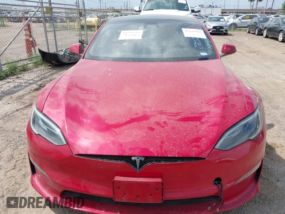 2022 Tesla Model S with VIN 5YJSA1E58NF486727, listed as a IAAI auction lot 42139418 with Not provided miles and . Bid and sale history available at DreamBid. Image 6.