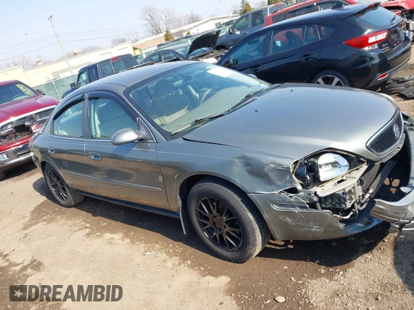 2003 Mercury Sable GS z VIN 1MEFM50243A619761, wystawiony jako IAAI lot #41790150 z przebiegiem 114 522 mil mil oraz . Historia ofert i sprzedaży dostępna na DreamBid. Obrazek 13.