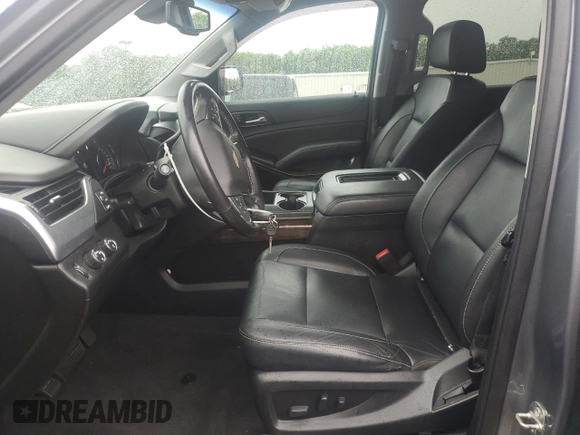 2020 Chevrolet Suburban LT with VIN 1GNSKHKC8LR149112, listed as a Copart auction lot 64085105 with 110,445 mi miles and Salvage title. Bid and sale history available at DreamBid. Image 7.