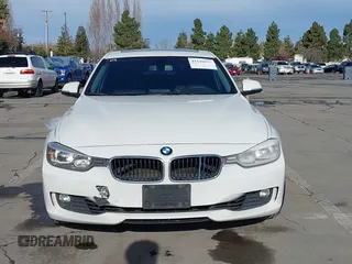 2015 BMW 3 Series 328i with VIN WBA3C1C52FK119339, listed as a IAAI auction lot 41549876 with 148,347 mi miles and . Bid and sale history available at carsss.com. Image 12.