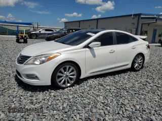 2013 Hyundai Azera z VIN KMHFH4JG4DA310590, wystawiony jako Copart lot #62472335 z przebiegiem 75 311 mil mil oraz Nie do naprawy • Non repairable. Historia ofert i sprzedaży dostępna na DreamBid. Obrazek 1.