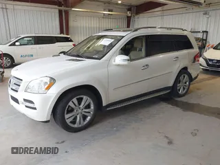 2011 Mercedes-Benz GL-Class GL 450 with VIN 4JGBF7BE9BA645344, listed as a IAAI auction lot 42099508 with 134,244 mi miles. Bid and sale history available at carsss.com. Image 2.