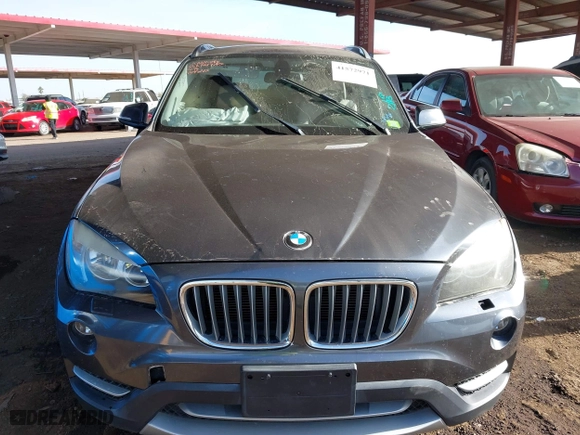 2013 BMW X1 28i with VIN WBAVM1C57DVW42096, listed as a IAAI auction lot 41572971 with 156,999 mi miles. Bid and sale history available at carsss.com. Image 11.