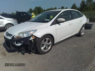 2013 Ford Focus SE with VIN 1FADP3F28DL215983, listed as a IAAI auction lot 42659890 with 117,912 mi miles and . Bid and sale history available at DreamBid. Image 17.