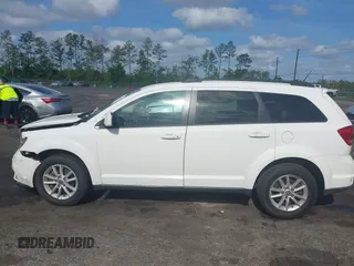2015 Dodge Journey SXT with VIN 3C4PDCBG0FT653857, listed as a IAAI auction lot 42128410 with 182,960 mi miles and . Bid and sale history available at DreamBid. Image 14.
