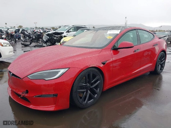 2022 Tesla Model S Plaid with VIN 5YJSA1E61NF485055, listed as a IAAI auction lot 41751134 with 1 mi miles. Bid and sale history available at carsss.com. Image 2.