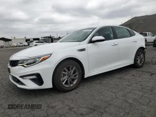 2019 Kia Optima LX z VIN 5XXGT4L33KG377586, wystawiony jako Copart lot #55782565 z przebiegiem 74 871 mil mil oraz Szkoda całkowita • Salvage title. Historia ofert i sprzedaży dostępna na DreamBid. Obrazek 1.