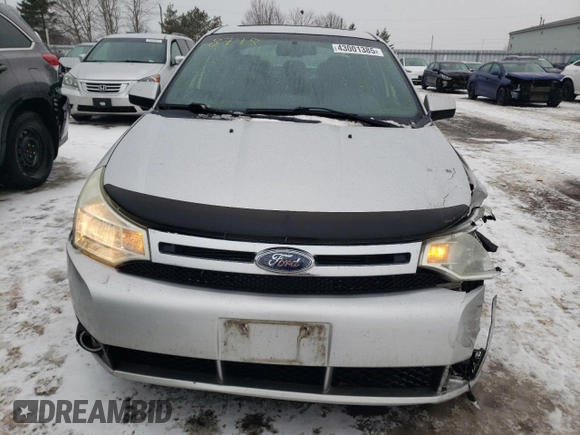 2009 Ford Focus SES with VIN 1FAHP36N19W214689, listed as a Copart auction lot 43001385 with 295,859 mi miles and Salvage Title. Bid and sale history available at carsss.com. Image 5.