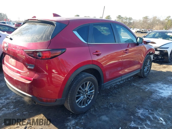 2017 Mazda CX-5 Touring with VIN JM3KFBCL1H0227290, listed as a IAAI auction lot 41400188 with 58,801 mi miles. Bid and sale history available at carsss.com. Image 4.