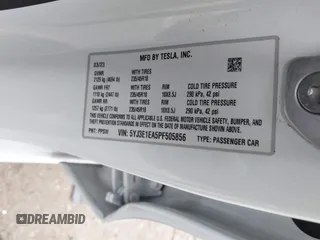2023 Tesla Model 3 with VIN 5YJ3E1EA5PF505856, listed as a IAAI auction lot 41885837 with 28,206 mi miles and . Bid and sale history available at carsss.com. Image 9.