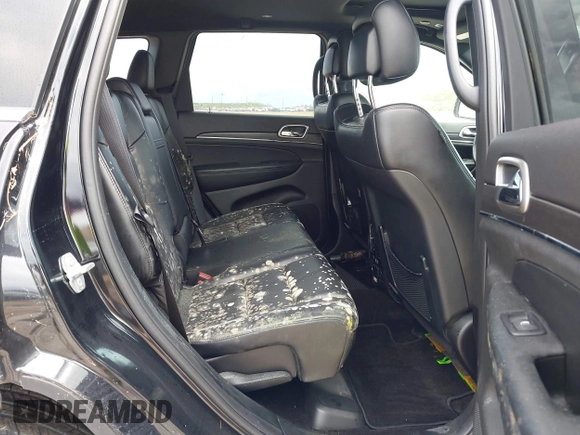 2018 Jeep Grand Cherokee Limited with VIN 1C4RJFBG8JC107833, listed as a IAAI auction lot 40654898 with 62,876 mi miles and . Bid and sale history available at DreamBid. Image 8.