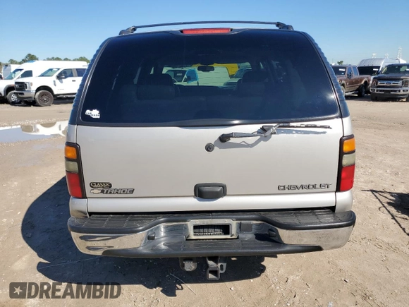 2004 Chevrolet Tahoe LT with VIN 1GNEC13Z84R187526, listed as a Copart auction lot 46661845 with 319,306 mi miles and Salvage title. Bid and sale history available at DreamBid. Image 6.