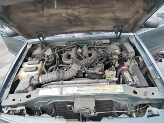 2000 Ford Explorer XLT z VIN 1FMZU73E9YZB18904, wystawiony jako Copart lot #47890925 z przebiegiem 248 363 mil mil oraz Szkoda całkowita • Salvage title. Historia ofert i sprzedaży dostępna na DreamBid. Obrazek 14.