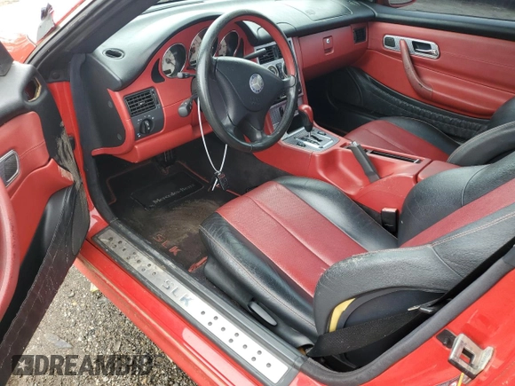 2003 Mercedes-Benz SLK 230 Kompressor z VIN WDBKK49F93F277828, wystawiony jako Copart lot #58344925 z przebiegiem Nie podano mil oraz Czysty tytuł • Clean title. Historia ofert i sprzedaży dostępna na DreamBid. Obrazek 8.