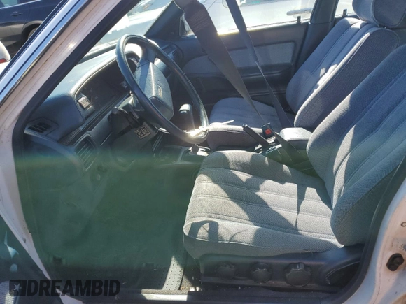 1988 Toyota Camry z VIN JT2SV21E7J3277138, wystawiony jako Copart lot #80039334 z przebiegiem 152 555 mil mil oraz Szkoda całkowita • Salvage title. Historia ofert i sprzedaży dostępna na DreamBid. Obrazek 7.