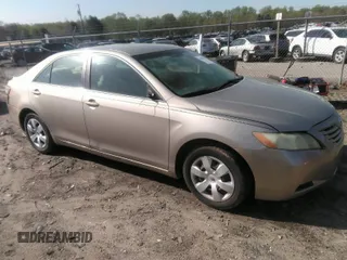 2007 Toyota Camry CE with VIN 4T1BE46K77U574068, listed as a IAAI auction lot 41934219 with 287,702 mi miles. Bid and sale history available at carsss.com. Image 1.