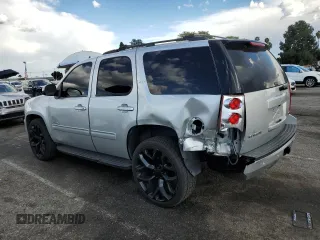 2014 GMC Yukon SLT with VIN 1GKS1CE05ER197674, listed as a Copart auction lot 45934674 with 130,623 mi miles and Salvage Title. Bid and sale history available at carsss.com. Image 2.
