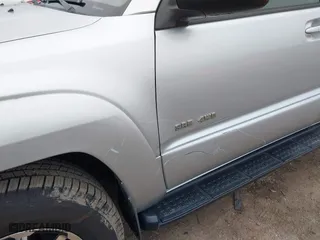 2005 Toyota 4Runner SR5 with VIN JTEBU14R050059290, listed as a IAAI auction lot 41906095 with 194,788 mi miles. Bid and sale history available at carsss.com. Image 18.