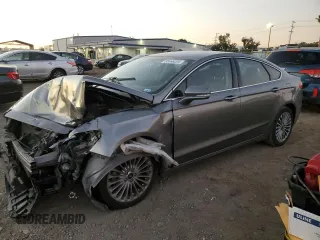 2014 Ford Fusion Titanium with VIN 3FA6P0K9XER367549, listed as a Copart auction lot 85566204 with 117,243 mi miles and Salvage Title. Bid and sale history available at DreamBid. Image 1.