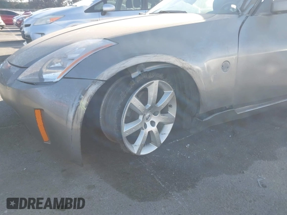 2004 Nissan 350Z Touring with VIN JN1AZ34E84T060682, listed as a IAAI auction lot 41616199 with 209,814 mi miles. Bid and sale history available at carsss.com. Image 12.