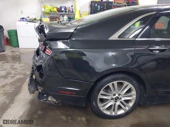 2014 Lincoln MKZ with VIN 3LN6L2J97ER814157, listed as a IAAI auction lot 41311342 with NaN miles. Bid and sale history available at carsss.com. Image 17.