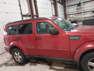 2008 Dodge Nitro SXT with VIN 1D8GU28K88W120319, listed as a IAAI auction lot 41683834 with 166,268 mi miles. Bid and sale history available at carsss.com. Image 14.
