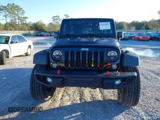 2015 Jeep Wrangler Unlimited Rubicon with VIN 1C4BJWFGXFL610153, listed as a IAAI auction lot 41575401 with 114,583 mi miles. Bid and sale history available at carsss.com. Image 12.