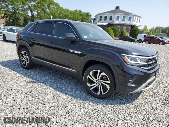 2023 Volkswagen Atlas SEL with VIN 1V2BE2CA1PC216733, listed as a Copart auction lot 59392255 with 28,011 mi miles and Salvage title. Bid and sale history available at DreamBid. Image 4.