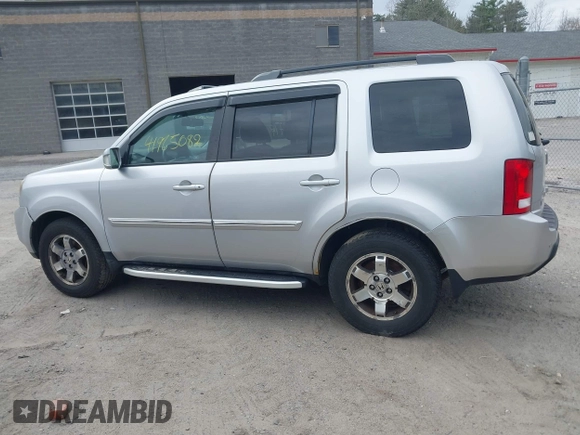 2011 Honda Pilot Touring with VIN 5FNYF4H90BB022354, listed as a IAAI auction lot 41965082 with 126,505 mi miles and . Bid and sale history available at carsss.com. Image 15.
