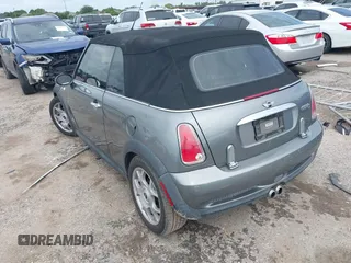2006 MINI Convertible S with VIN WMWRH33586TF87791, listed as a IAAI auction lot 42679478 with 90,209 mi miles and . Bid and sale history available at DreamBid. Image 3.