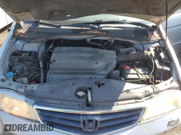 2003 Honda Odyssey EX-L z VIN 5FNRL18903B007639, wystawiony jako Copart lot #57230975 z przebiegiem 189 235 mil mil oraz Szkoda całkowita • Salvage title. Historia ofert i sprzedaży dostępna na DreamBid. Obrazek 12.