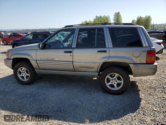 1998 Jeep Grand Cherokee Limited z VIN 1J4GZ88Z1WC231772, wystawiony jako Copart lot #55697775 z przebiegiem 178 896 mil mil oraz Czysty tytuł • Clean title. Historia ofert i sprzedaży dostępna na DreamBid. Obrazek 2.