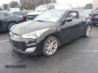 2013 Hyundai Veloster w/Gray Int with VIN KMHTC6AD6DU172892, listed as a IAAI auction lot 41518462 with 167,251 mi miles. Bid and sale history available at carsss.com. Image 2.