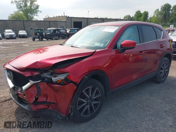 2018 Mazda CX-5 Grand Touring with VIN JM3KFBDM2J0448555, listed as a IAAI auction lot 42449282 with 65,770 mi miles and . Bid and sale history available at DreamBid. Image 18.