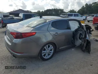 2013 Kia Optima EX с VIN 5XXGN4A77DG213051, выставлен на аукционе Copart как лот 58849865 с пробегом Не указан миль и Списание • Salvage title. История ставок и продаж доступна на DreamBid. Изображение 3.