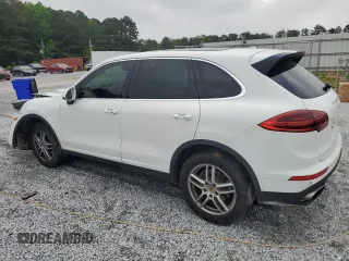 2016 Porsche Cayenne z VIN WP1AA2A25GLA10575, wystawiony jako Copart lot #56941595 z przebiegiem Nie podano mil oraz Szkoda całkowita • Salvage title. Historia ofert i sprzedaży dostępna na DreamBid. Obrazek 2.