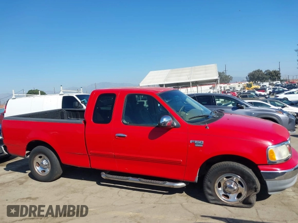 2002 Ford F-150 XL with VIN 1FTRX17W52NA81828, listed as a IAAI auction lot 41450811 with 201,948 mi miles. Bid and sale history available at carsss.com. Image 13.