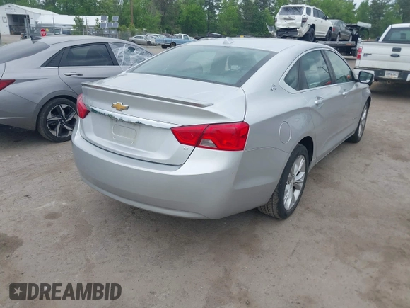 2014 Chevrolet Impala LT with VIN 2G1125S3XE9114130, listed as a IAAI auction lot 42128077 with 209,391 mi miles and . Bid and sale history available at DreamBid. Image 4.