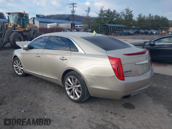 2014 Cadillac XTS Luxury z VIN 2G61M5S37E9304598, wystawiony jako IAAI lot #41006051 z przebiegiem 115 879 mil mil oraz . Historia ofert i sprzedaży dostępna na DreamBid. Obrazek 3.