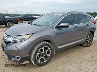 2018 Honda CR-V Touring z VIN 7FARW1H93JE010205, wystawiony jako Copart lot #58028085 z przebiegiem 42 647 mil mil oraz Szkoda całkowita • Salvage title. Historia ofert i sprzedaży dostępna na DreamBid. Obrazek 1.