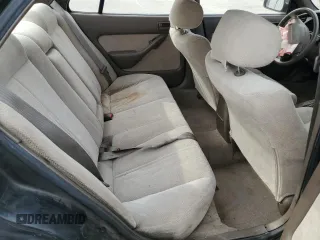 1995 Toyota Camry LE with VIN JT2GK12E2S0079545, listed as a Copart auction lot 84058164 with 150,539 mi miles and Salvage Title. Bid and sale history available at carsss.com. Image 10.