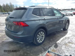 2018 Volkswagen Tiguan S with VIN 3VV0B7AX2JM011628, listed as a IAAI auction lot 41685841 with 129,484 mi miles and . Bid and sale history available at DreamBid. Image 4.