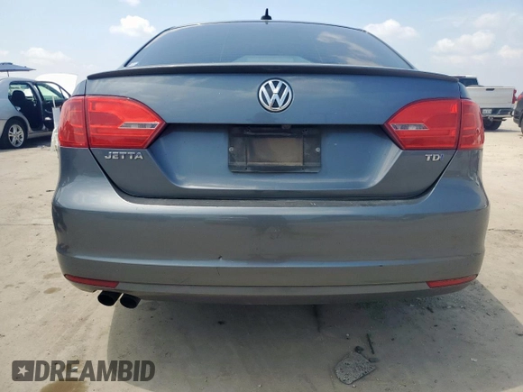 2014 Volkswagen Jetta TDI w/Premium/Nav with VIN 3VWLL7AJ7EM385112, listed as a Copart auction lot 58063295 with 169,683 mi miles and Salvage title. Bid and sale history available at DreamBid. Image 6.