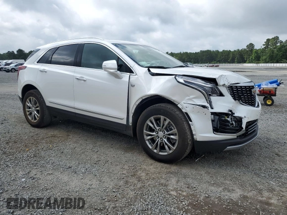 2021 Cadillac XT5 AWD Premium Luxury with VIN 1GYKNDRSXMZ103637, listed as a Copart auction lot 60472755 with 19,652 mi miles and Salvage title. Bid and sale history available at DreamBid. Image 4.