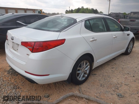 2013 Kia Optima LX with VIN KNAGM4A76D5374463, listed as a IAAI auction lot 42007879 with 167,445 mi miles. Bid and sale history available at carsss.com. Image 4.